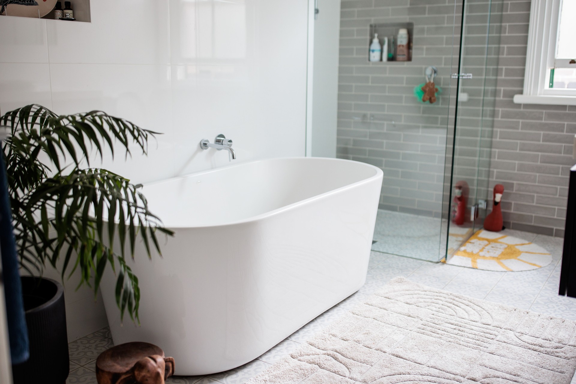 Contemporary bathroom with sleek style and greenery